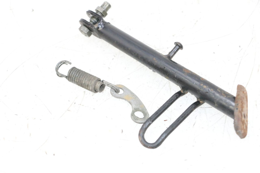 photo de CABALLETE LATERAL SYM ORBIT 2 50 (2008 - 2014) - Detalle de la pieza