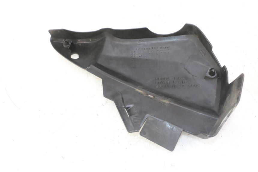 photo de TAPA DEBAJO DEL ASIENTO IZQUIERDO HONDA CBF 500 (2004 - 2007)