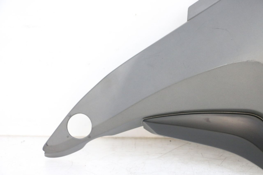 photo de TAPA BAJO ASIENTO IZQUIERDA KSR CODE 125 (2018 - 2020) - Recambio usado revisado