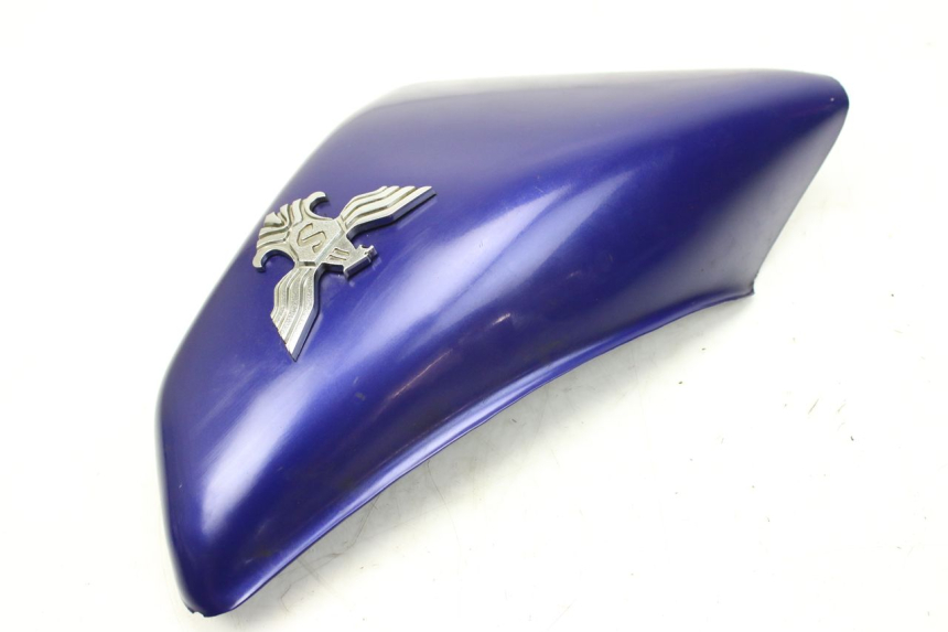 photo de TAPA DEBAJO DEL ASIENTO IZQUIERDO SYM HUSKY 125 (1999 - 2005)