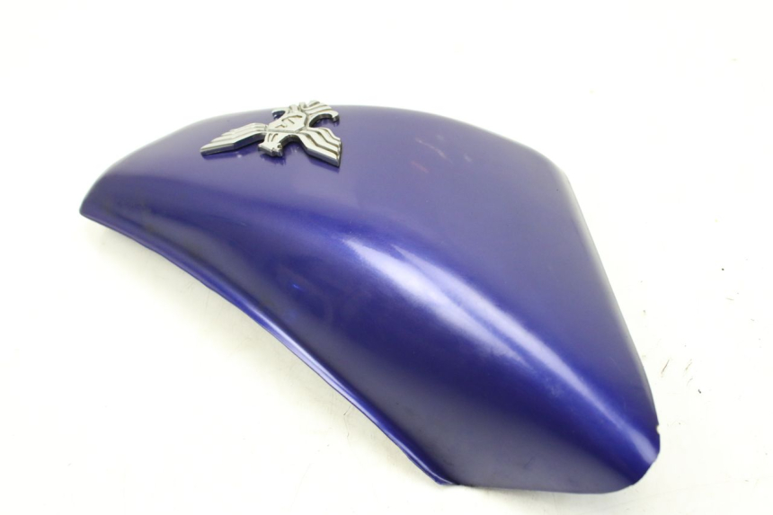 photo de TAPA DEBAJO DEL ASIENTO IZQUIERDO SYM HUSKY 125 (1999 - 2005)