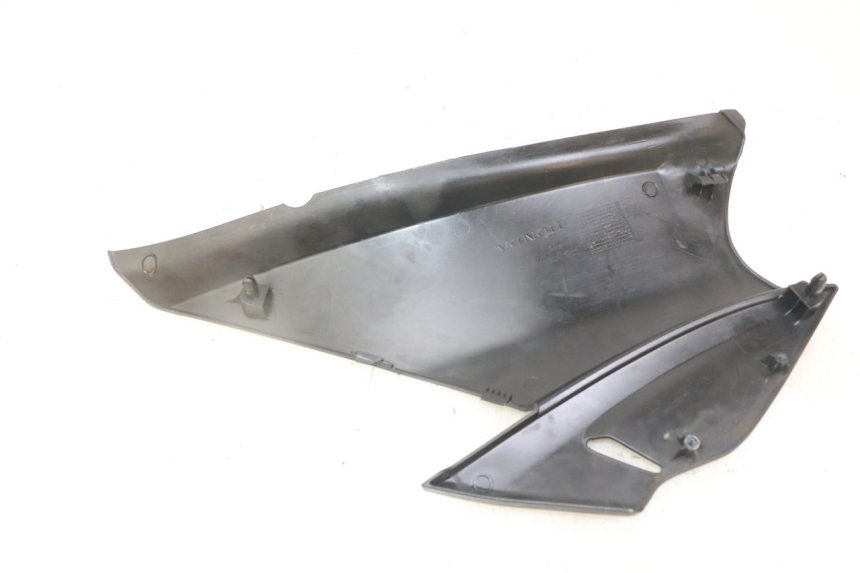 photo de TAPA BAJO ASIENTO IZQUIERDA HONDA NTV DEAUVILLE ABS 700 (2007 - 2016)