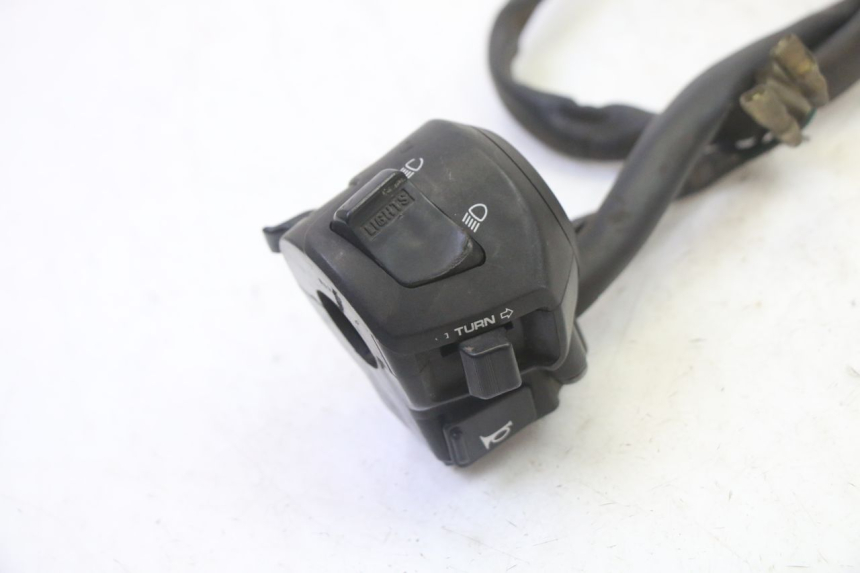 photo de INTERRUPTOR DE LUCES IZQUIERDO. HONDA FES S-WING SWING ABS 125 (2007 - 2015)