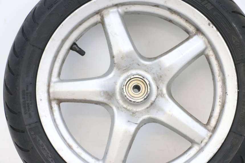 photo de LLANTA DELANTERA Y NEUMÁTICO MBK FLAME X 125 (2007 - 2016) - Zoom sobre los componentes