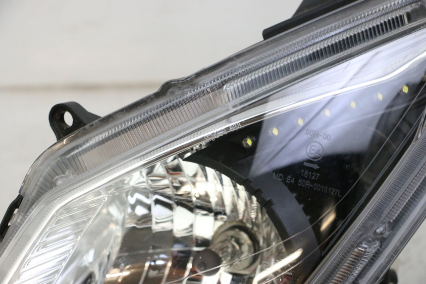 photo de FARO DELANTERO IZQUIERDA SYM JOYMAX 125 (2010 - 2017)